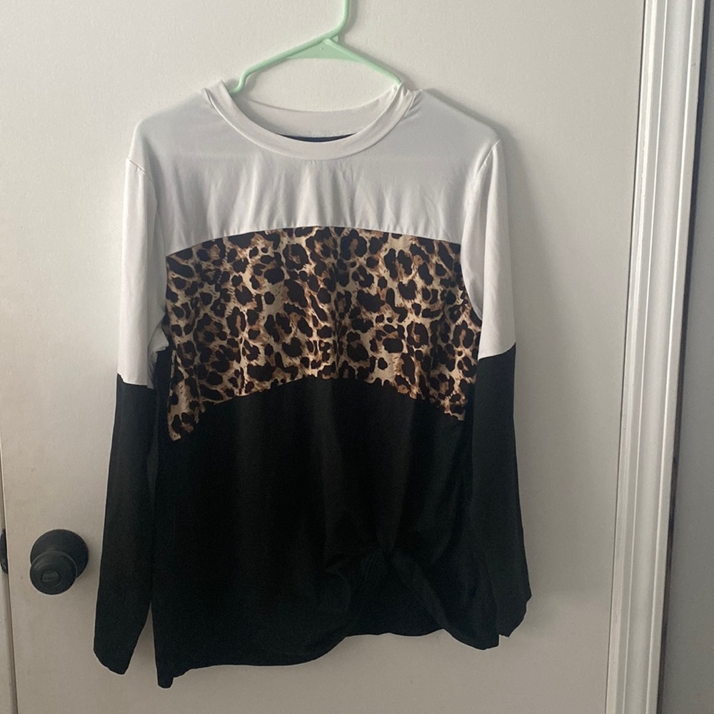 Long sleeve top with tie at the bottom